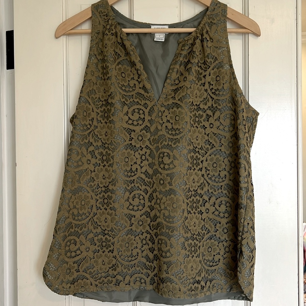Sleeveless lace overlay top.